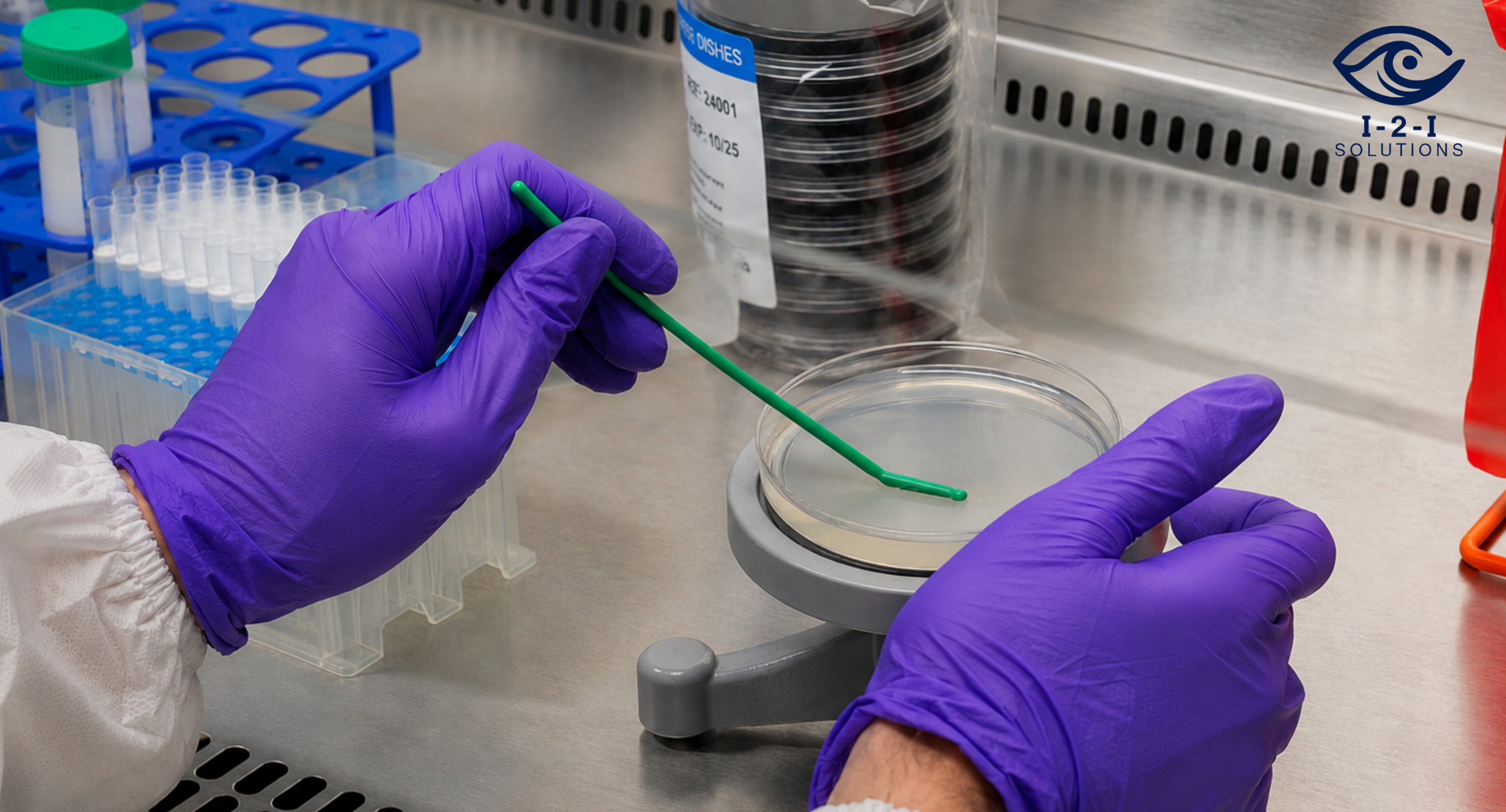 Laboratory technician performing SM 9215 C dental water testing using R2A agar for dental unit waterline monitoring – I-2-I Solutions